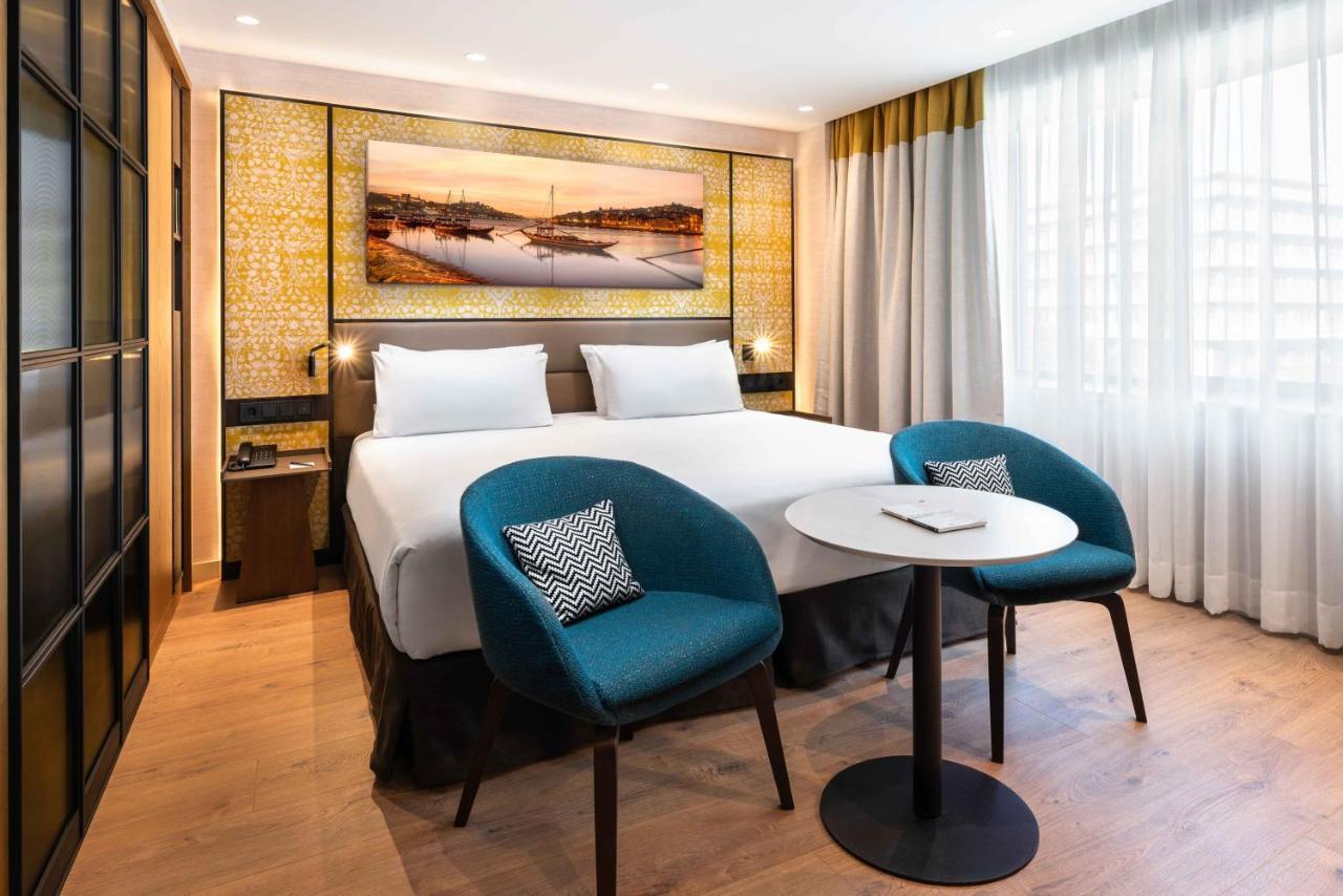 فندق Eurostars Aliados بورتو المظهر الخارجي الصورة A room at the hotel