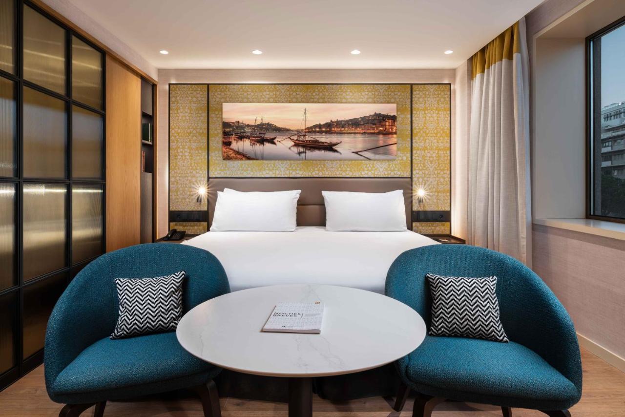 فندق Eurostars Aliados بورتو المظهر الخارجي الصورة A room at the hotel