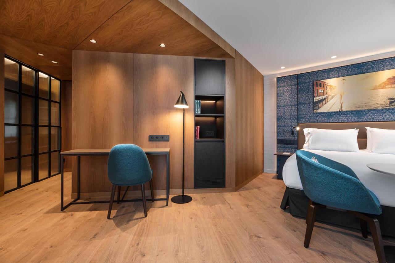 فندق Eurostars Aliados بورتو المظهر الخارجي الصورة A room at the hotel