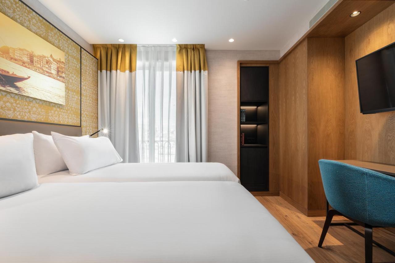 فندق Eurostars Aliados بورتو المظهر الخارجي الصورة A room at the hotel