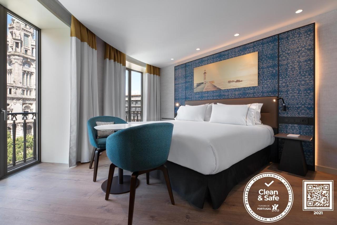 فندق Eurostars Aliados بورتو المظهر الخارجي الصورة A Clean & Safe certified hotel room in Lisbon, Portugal