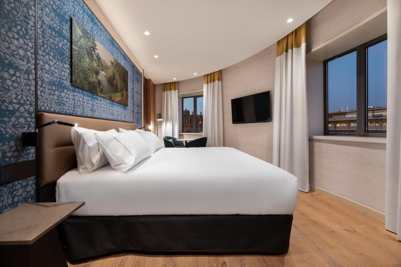 فندق Eurostars Aliados بورتو المظهر الخارجي الصورة A bedroom at the hotel