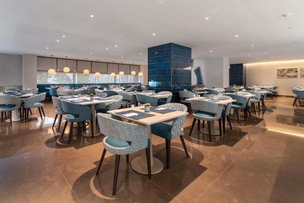 فندق Eurostars Aliados بورتو المظهر الخارجي الصورة The lounge at London Heathrow Airport